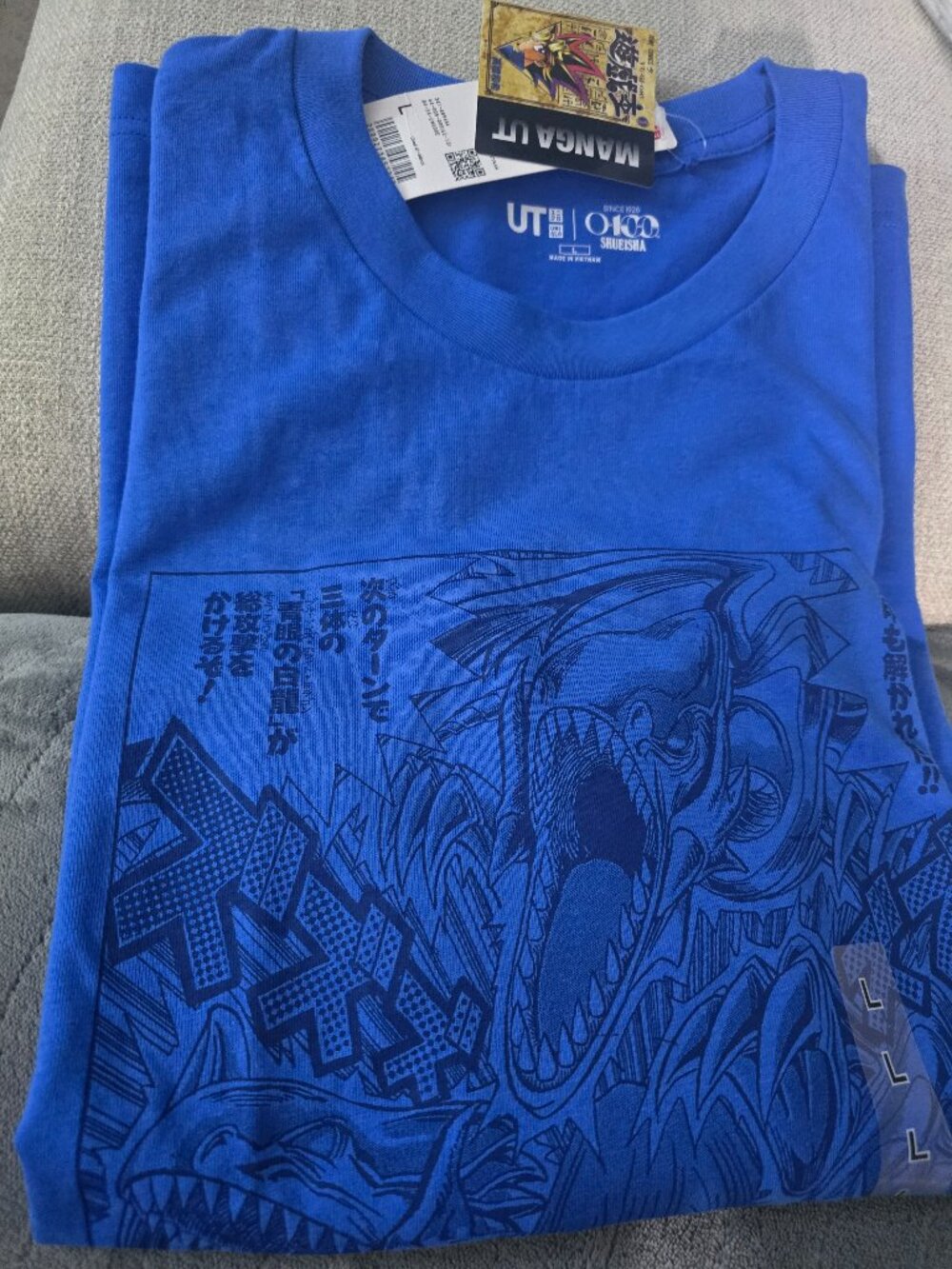 New Uniqlo Yugioh anime graphic t-shirt blue eyes white dragon sizes XS-XL